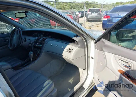 2002 Toyota Avalon Xls z USA, uszkodzony, nr VIN 4T1BF28B72U230568